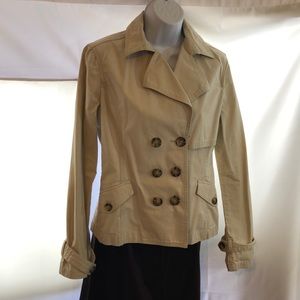 apt.9 tan jacket with 6 brown button on front.